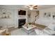 Inviting living room features a fireplace, modern decor, and wood-look flooring at 333 O'Leary Circle, Summerville, SC 29483