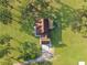 Aerial view of the house showing roof, back patio, and large back yard at 341 Sugar Hill Rd, Saint George, SC 29477