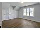 Spacious bedroom with wood floors, natural light, and closet space at 341 Sugar Hill Rd, Saint George, SC 29477
