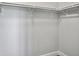 Walk-in closet offers ample storage with a white shelving and hanging system at 341 Sugar Hill Rd, Saint George, SC 29477