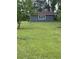 Well-maintained, matching shed with window and ample space for storage or hobbies at 341 Sugar Hill Rd, Saint George, SC 29477
