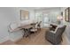 Bright dining area with shiplap walls, bench seating, and natural light from the window at 35 Campbell Dr, Charleston, SC 29407
