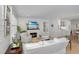 Bright, open-concept living space with fireplace and seamless transition to the kitchen at 35 Campbell Dr, Charleston, SC 29407