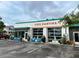 Exterior view of FUEL CANTINA restaurant featuring bright blue chairs and patio seating at 3.5 Kracke St # C, Charleston, SC 29403