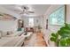Inviting living room featuring stylish furnishings, hardwood floors, and plenty of natural light at 3.5 Kracke St # C, Charleston, SC 29403