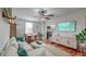 Open-concept living area with hardwood floors, stylish furniture, and modern decor offers a welcoming space at 3.5 Kracke St # C, Charleston, SC 29403