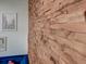 Close-up of a brick accent wall, creating a warm and inviting space at 3.5 Kracke St # C, Charleston, SC 29403