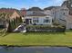 Beautiful backyard and home, featuring a cozy patio area and a scenic pond, creating a serene outdoor space at 3608 Maidstone Dr, Mount Pleasant, SC 29466