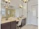 Elegant bathroom featuring a double sink vanity, glass shower, and separate soaking tub at 3608 Maidstone Dr, Mount Pleasant, SC 29466