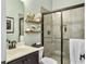 Bathroom featuring a glass shower, vanity, and decorative coastal themed décor at 3608 Maidstone Dr, Mount Pleasant, SC 29466