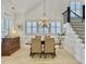 Dining room with wood floors, a decorative chandelier, and staircase at 3608 Maidstone Dr, Mount Pleasant, SC 29466