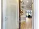 An inviting entryway features a frosted glass door and hardwood floors leading into the home at 3608 Maidstone Dr, Mount Pleasant, SC 29466