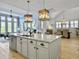 Open concept kitchen island with sink and barstool seating at 3608 Maidstone Dr, Mount Pleasant, SC 29466