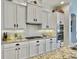Bright kitchen with white cabinets, stainless appliances, and granite countertops at 3608 Maidstone Dr, Mount Pleasant, SC 29466