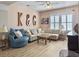 Comfortable living area with light walls, wood floors, modern furniture, and natural light at 3608 Maidstone Dr, Mount Pleasant, SC 29466