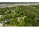 Aerial view of a neighborhood featuring wooded areas and residential homes at 3924 Regal Oak Ln, Johns Island, SC 29455