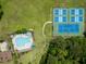 Aerial view of pool and tennis courts offering recreational amenities at 3924 Regal Oak Ln, Johns Island, SC 29455
