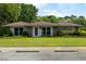 Exterior of the Gift Plantation with well-maintained lawn and parking at 3924 Regal Oak Ln, Johns Island, SC 29455