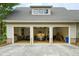Large, multi-car garage with ample storage and workspace at 3924 Regal Oak Ln, Johns Island, SC 29455