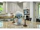 Lovely kitchen with granite counters, stainless steel appliances, and bright natural lighting at 3924 Regal Oak Ln, Johns Island, SC 29455