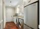 Bright laundry room with stainless steel appliances and granite countertops at 3924 Regal Oak Ln, Johns Island, SC 29455