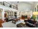 Spacious open concept living area with high ceilings, hardwood floors, and seamless flow to the kitchen at 3924 Regal Oak Ln, Johns Island, SC 29455