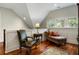 Cozy sitting room with comfortable chairs, wood floors and an abundance of natural light at 3924 Regal Oak Ln, Johns Island, SC 29455