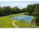 An aerial view showcases the community's well-maintained tennis courts at 3924 Regal Oak Ln, Johns Island, SC 29455