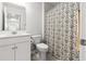 Bathroom showcasing a vanity, toilet, and shower with patterned curtain at 3952 Treebranch Cir Cir, Mount Pleasant, SC 29429