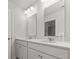Bright bathroom features a double vanity with white countertops and a glass shower at 3952 Treebranch Cir Cir, Mount Pleasant, SC 29429
