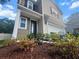 Charming two-story home boasts manicured landscaping, an attached garage, and inviting curb appeal at 3952 Treebranch Cir Cir, Mount Pleasant, SC 29429