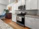 Modern kitchen features stainless steel appliances, granite countertops, and white cabinetry at 3952 Treebranch Cir Cir, Mount Pleasant, SC 29429