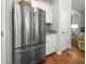 Kitchen features stainless steel refrigerator, granite counters and white shaker cabinets at 3952 Treebranch Cir Cir, Mount Pleasant, SC 29429