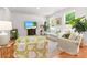 Inviting living room with comfortable seating and stylish decor, featuring large windows for natural light at 3952 Treebranch Cir Cir, Mount Pleasant, SC 29429