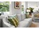 Bright living room with a comfortable sofa and an abundance of natural light from multiple windows at 3952 Treebranch Cir Cir, Mount Pleasant, SC 29429