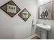 Powder room featuring decor and a pedestal sink at 3952 Treebranch Cir Cir, Mount Pleasant, SC 29429