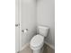Powder room with ceramic tile floor and a toilet with a white elongated bowl at 3952 Treebranch Cir Cir, Mount Pleasant, SC 29429