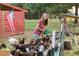 Rural farmland with goats and a smiling Personal holding a feed scoop in an outdoor environment at 3997 Chantey Crest, Johns Island, SC 29455