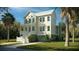 Charming two-story home with a inviting front porch and well-manicured lawn, perfect for Southern living at 3997 Chantey Crest, Johns Island, SC 29455