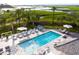 Scenic pool area overlooking lush marshlands and the ocean with comfortable lounge chairs and umbrellas at 3997 Chantey Crest, Johns Island, SC 29455