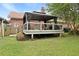 A delightful backyard deck featuring a gazebo with comfortable outdoor seating, perfect for relaxation and entertaining at 415 Whitebark Dr, Ladson, SC 29456