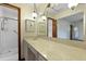 Bathroom with a long vanity, shower and mirror at 415 Whitebark Dr, Ladson, SC 29456