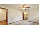 Spacious bedroom featuring a view of the en suite bathroom and ceiling fan at 415 Whitebark Dr, Ladson, SC 29456