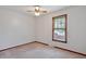 Bright bedroom featuring neutral walls, ceiling fan, and a window providing natural light at 415 Whitebark Dr, Ladson, SC 29456
