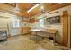 Functional workshop with pegboard, workbench, and storage cabinets, ideal for DIY projects and hobbies at 415 Whitebark Dr, Ladson, SC 29456