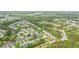Aerial view of a community featuring tree lined streets and green spaces at 4209 Climbing Tree Ct, Charleston, SC 29414