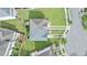 An aerial view shows the roof and backyard space of the property, and surrounding neighborhood at 4209 Climbing Tree Ct, Charleston, SC 29414