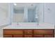 Bathroom vanity featuring double sinks and a large mirror at 4209 Climbing Tree Ct, Charleston, SC 29414