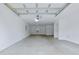 Spacious garage featuring concrete floors, white walls and a small window at 4209 Climbing Tree Ct, Charleston, SC 29414