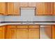 Kitchen area with stainless steel dishwasher and double sink at 4209 Climbing Tree Ct, Charleston, SC 29414